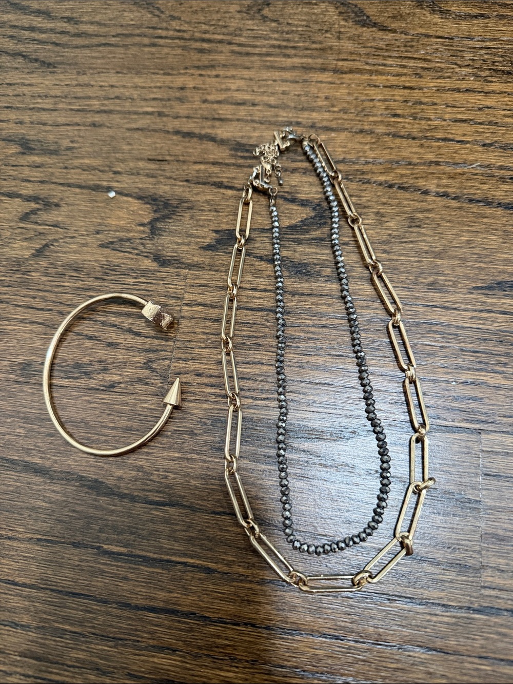 Trendy boutique Gold and Gunmetal Layered Necklace Set